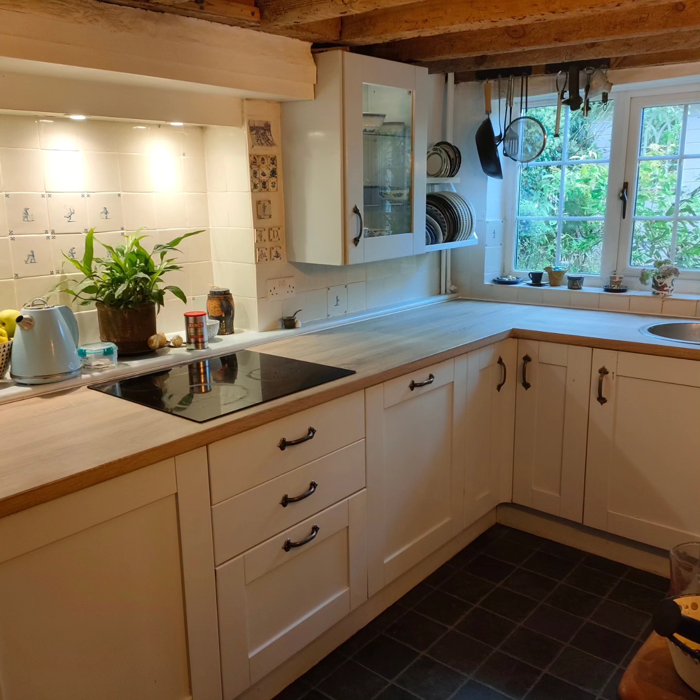 Cream shaker kitchen with new light oak worktops
